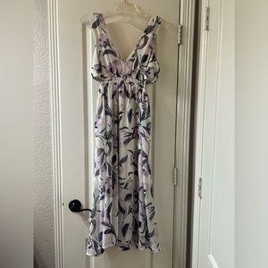 Floral print dress with side cut outs, low v neck, size L